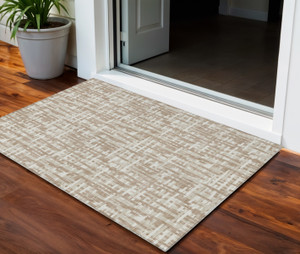 3' X 5' Tan And Beige Abstract Washable Indoor Outdoor Area Rug