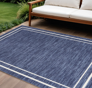 9' X 12' Navy Blue And Ivory Indoor Outdoor Area Rug