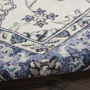 7' X 10' Ivory And Blue Floral Indoor Outdoor Area Rug