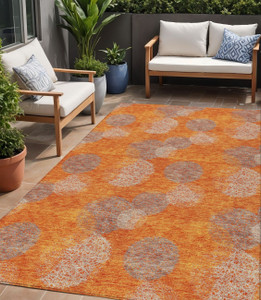5' X 8' Orange Silver And Peach Polka Dot Washable Indoor Outdoor Area Rug