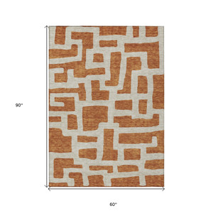 5' X 8' Terra Cotta And Gray Abstract Washable Indoor Outdoor Area Rug