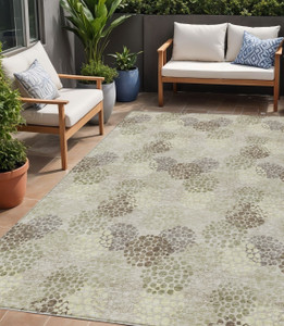 5' X 8' Beige Green And Ivory Polka Dot Washable Indoor Outdoor Area Rug