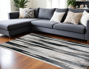 7' X 10' Black Silver and Gray Abstract Power Loom Area Rug