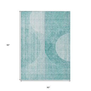 5' X 8' Teal Blue And Aqua Geometric Washable Indoor Outdoor Area Rug
