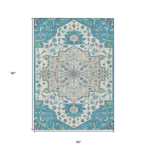 5' X 8' Teal Blue Green And Ivory Oriental Washable Indoor Outdoor Area Rug