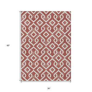 3' X 5' Burgundy And Ivory Geometric Washable Indoor Outdoor Area Rug