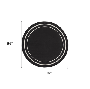 8' Black And Ivory Round Indoor Outdoor Area Rug