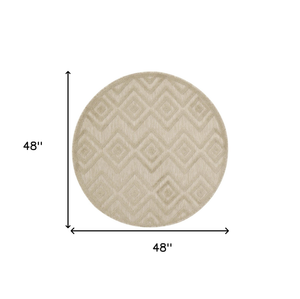 4' Cream And Beige Round Geometric Indoor Outdoor Area Rug
