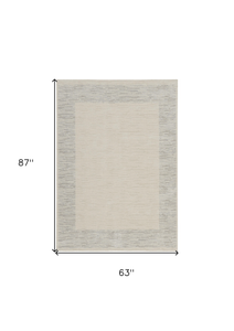 5' X 7' Gray And Ivory Striped Area Rug