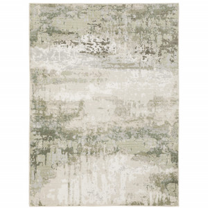 5' X 8' Beige Grey Brown And Sage Green Abstract Power Loom Stain Resistant Area Rug - 606114596783