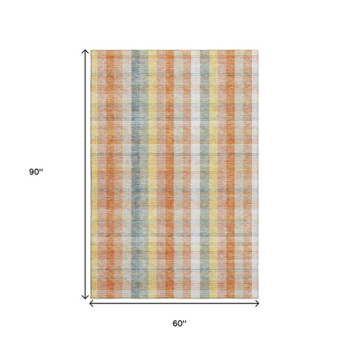 5' X 8' Peach Ivory And Yellow Plaid Washable Area Rug With UV Protection