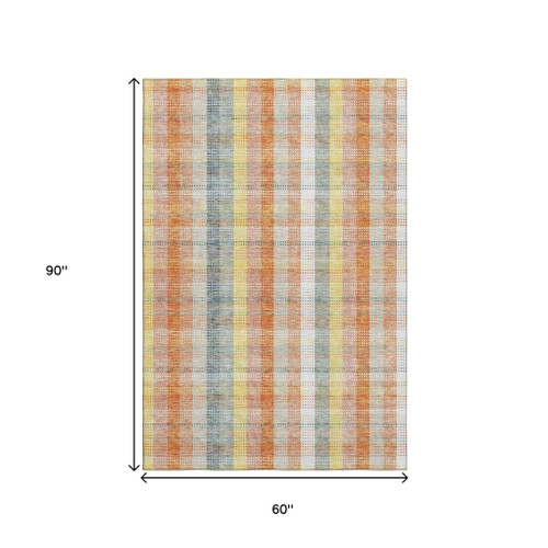 5' X 8' Peach Ivory And Yellow Plaid Washable Area Rug With UV Protection