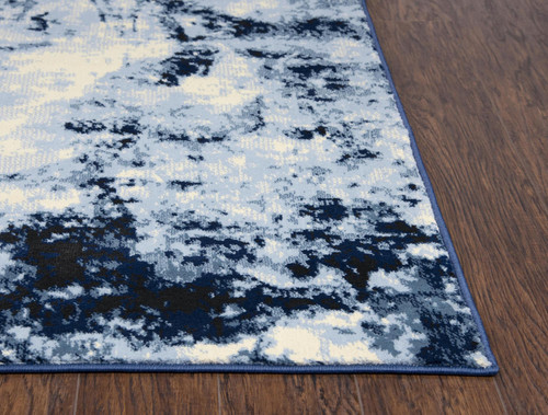 5' X 8' Blue And Ivory Abstract Area Rug