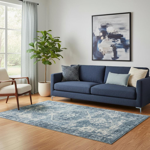5' X 7' Blue And Ivory Medallion Distressed Washable Area Rug