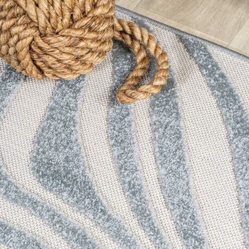 7' Light Blue And Ivory Round Abstract Indoor Outdoor Area Rug