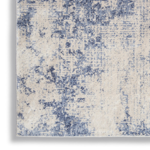 4' X 6' Ivory And Blue Abstract Area Rug