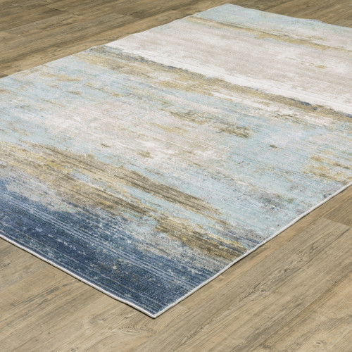 7' X 10' Blue And Beige Abstract Area Rug