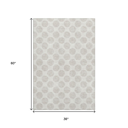3' X 5' Ivory And Beige Polka Dot Washable Area Rug With UV Protection