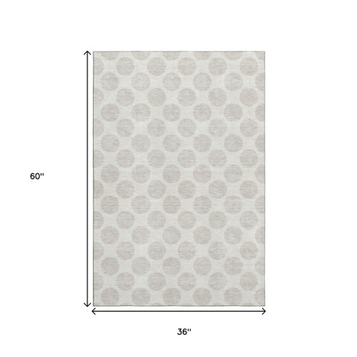 3' X 5' Ivory And Beige Polka Dot Washable Area Rug With UV Protection