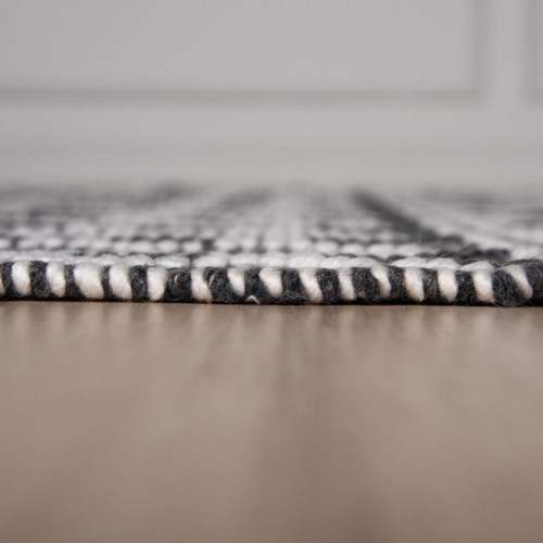 5' X 8' Gray Black And Ivory Chevron Hand Woven Area Rug With UV Protection