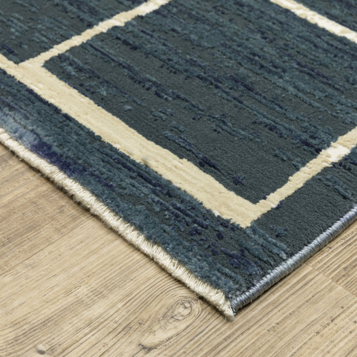 3' X 5' Blue And Ivory Geometric Area Rug