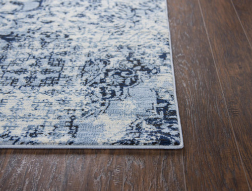 5' X 8' Ivory Blue And Dark Blue Oriental Area Rug