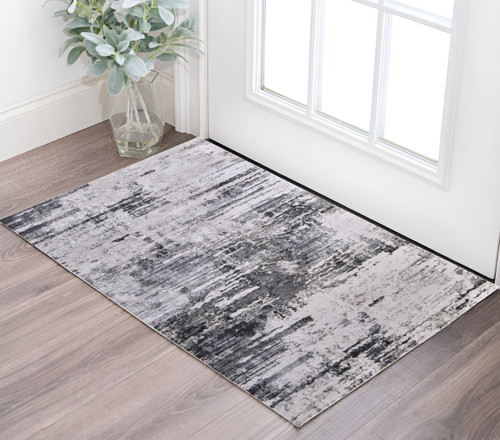 2' X 3' Ivory and Gray Abstract Power Loom Worn Faded Area Rug