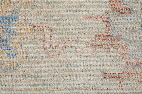 5' X 8' Tan Brown and Blue Floral Hand Woven Distressed Area Rug With Fringe