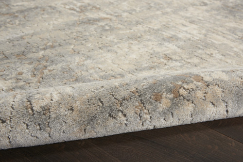 7' X 10' Beige and Gray Abstract Power Loom Area Rug