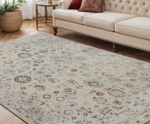 5' X 8' Ivory Blue And Gray Floral Medallion Area Rug