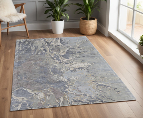 4' X 6' Ivory Taupe and Green Abstract Hand Tufted Worn Faded Area Rug
