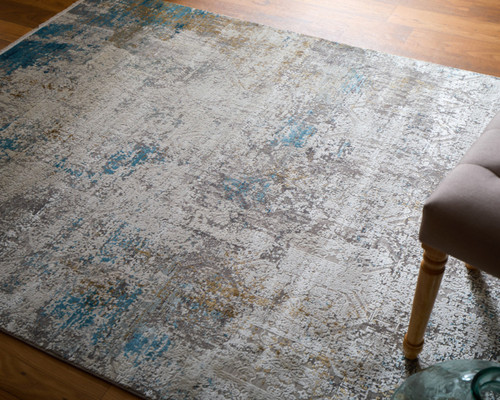 3' X 5' Ivory Gray and Blue Abstract Power Loom Area Rug With Fringe