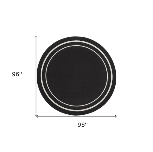 8' Black And Ivory Round Indoor Outdoor Area Rug