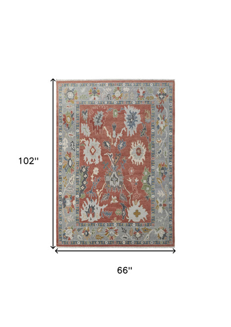 6' X 9' Gray Red and Ivory Wool Floral Hand Knotted Area Rug With Fringe