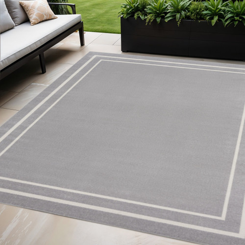 5' X 7' Gray And Ivory Indoor Outdoor Area Rug
