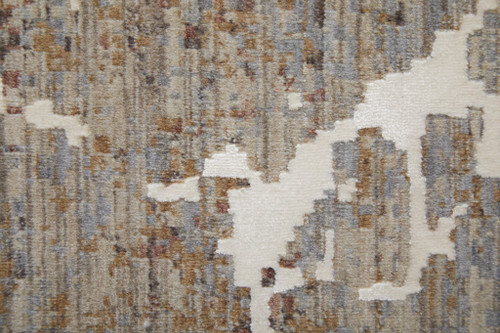 7' X 10' Ivory Brown and Taupe Abstract Power Loom Area Rug