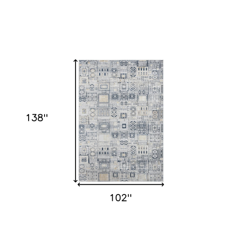 9' X 12' Ivory Black And Gold Ikat Area Rug