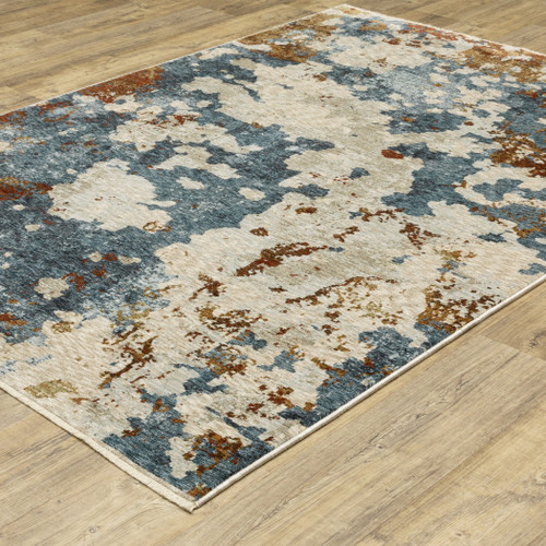 10' X 13' Beige Rust And Teal Abstract Distressed Area Rug With Fringe