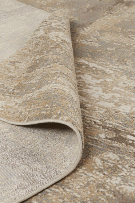 5' X 8' Tan Ivory And Brown Abstract Area Rug