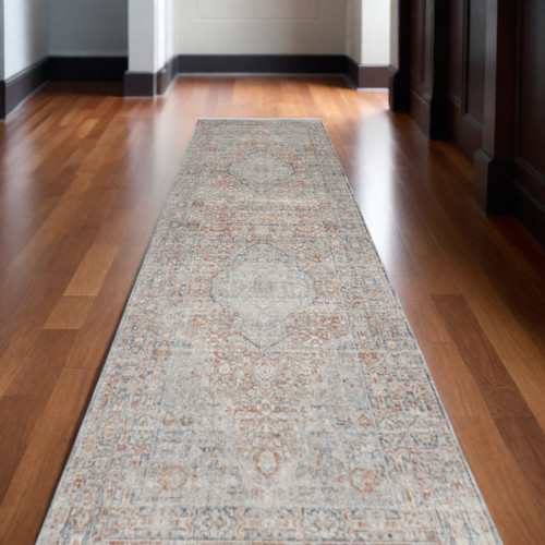 10' Gray Ivory and Orange Oriental Power Loom Runner Rug With Fringe