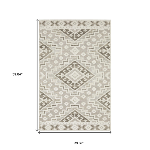 3' X 5' Beige And Brown Tribal Area Rug
