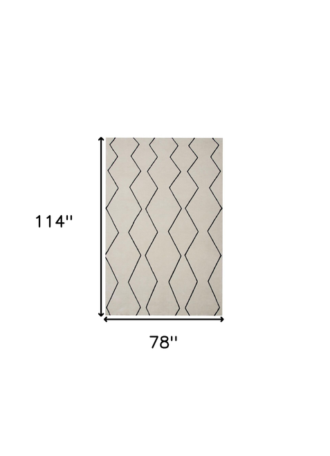 7' X 10' Beige and Black Geometric Power Loom Distressed Non Skid Area Rug