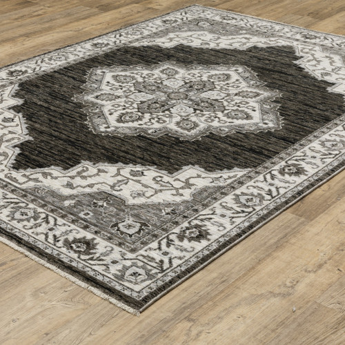 8' X 11' Charcoal And Ivory Medallion Area Rug With Fringe