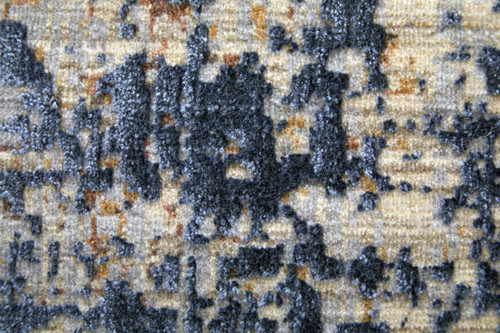 7' X 10' Blue Brown and Tan Abstract Power Loom Area Rug
