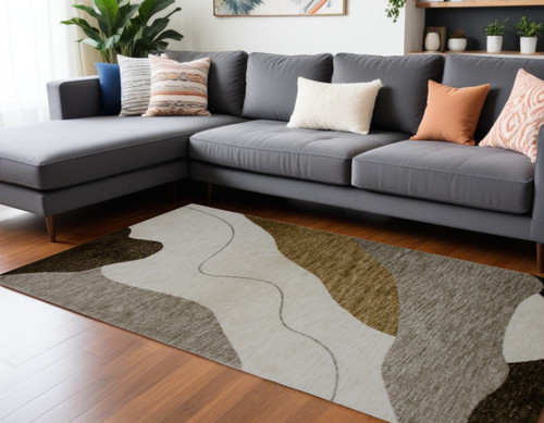 7' X 10' Beige and Green Abstract Distressed Area Rug