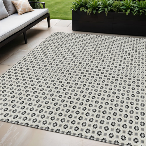 5' X 8' Ivory And Black Floral Washable Indoor Outdoor Area Rug