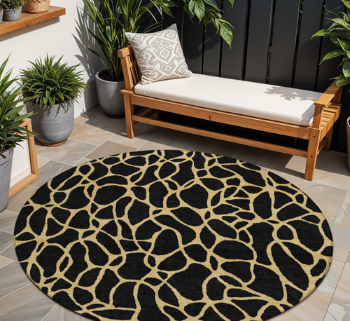 8' Black And Gold Round Geometric Washable Indoor Outdoor Area Rug