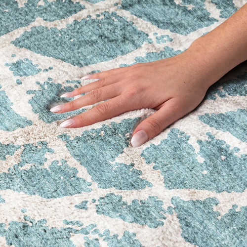 9' X 12' Teal And Ivory Geometric Shag Washable Area Rug With UV Protection