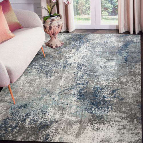 5' X 8' Ivory Blue and Gray Abstract Power Loom Area Rug