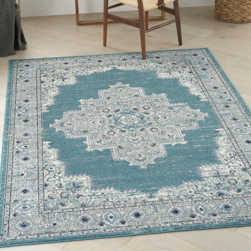 5' x 7' Aqua Floral Power Loom Distressed Area Rug